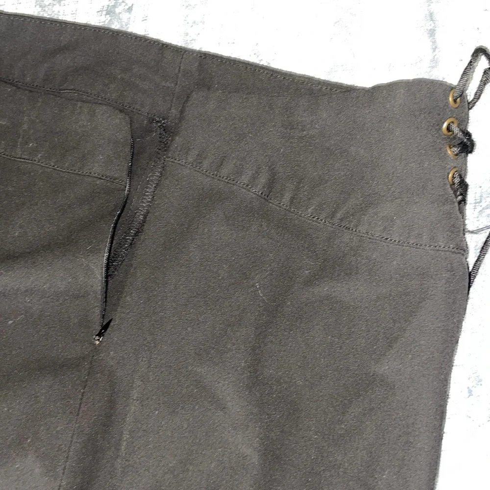 Women’s size 6, black pencil skirt stretchy. Lattice lace up. Hidden side zipper